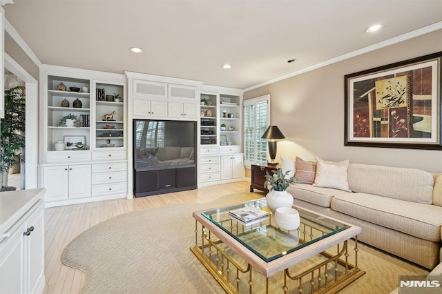 living area with light wood-style floors, recessed lighting, and ornamental molding