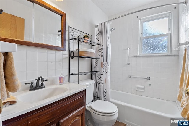 full bath with toilet, vanity, tile walls, tasteful backsplash, and shower / bath combo with shower curtain