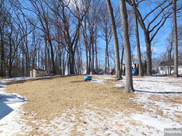 view of yard covered in snow