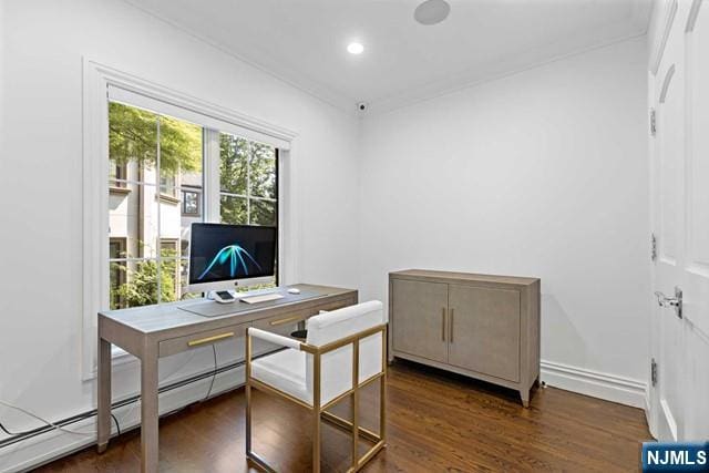 home office featuring recessed lighting, a baseboard heating unit, and wood finished floors