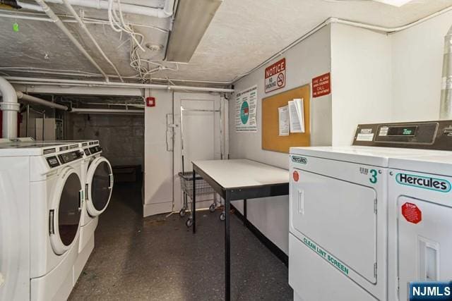 common laundry area featuring independent washer and dryer