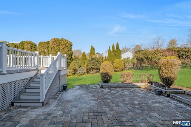 view of patio / terrace featuring stairs