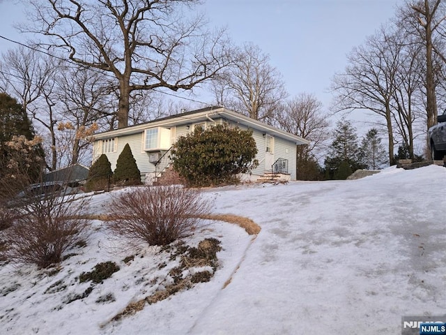 view of snow covered property