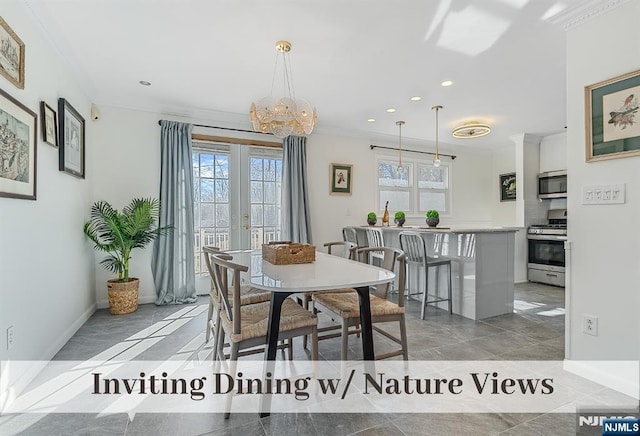 dining room with ornamental molding, recessed lighting, french doors, and plenty of natural light