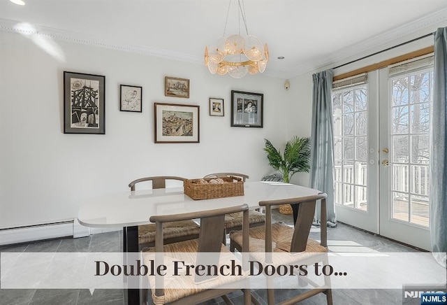 dining area featuring a chandelier, french doors, a baseboard radiator, and crown molding