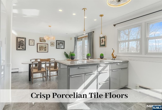 kitchen featuring hanging light fixtures, baseboard heating, gray cabinets, crown molding, and recessed lighting