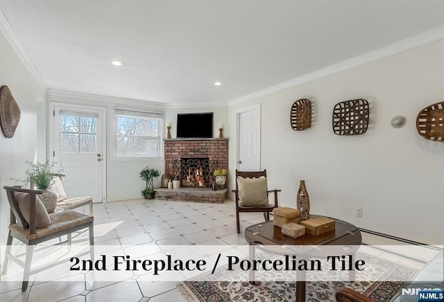 living area featuring recessed lighting, baseboard heating, a brick fireplace, and crown molding