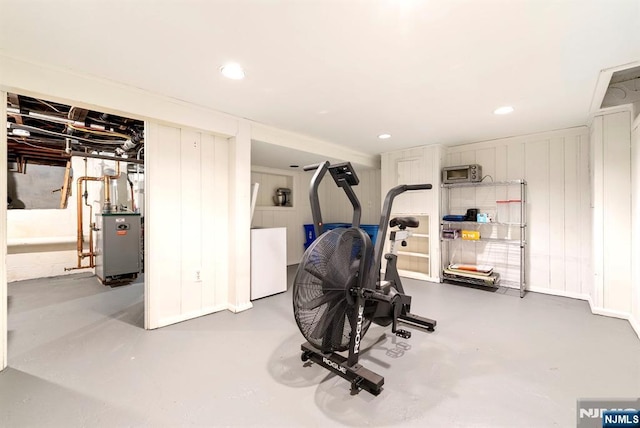 workout area with recessed lighting and a heating unit