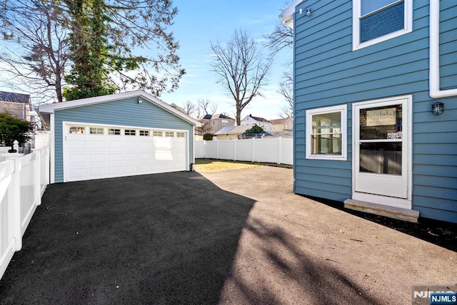 detached garage with fence