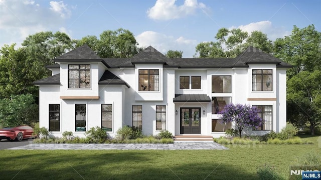 french country inspired facade with metal roof, french doors, and a front lawn