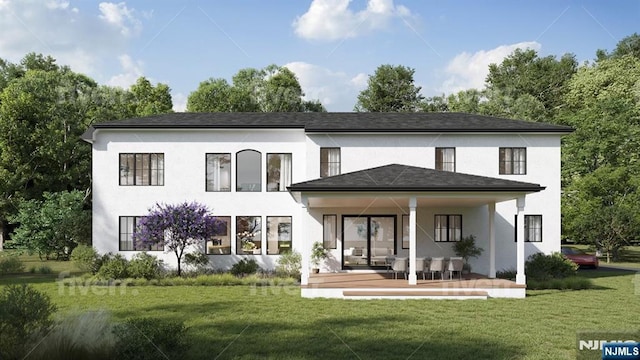 back of house featuring stucco siding and a yard