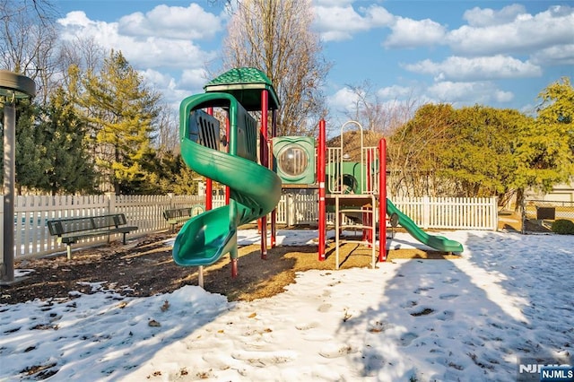 communal playground featuring fence