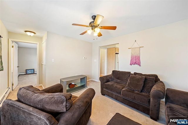 living room featuring a baseboard heating unit, baseboards, a ceiling fan, and light colored carpet