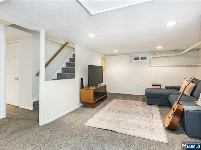 living area with carpet, stairs, baseboards, and recessed lighting