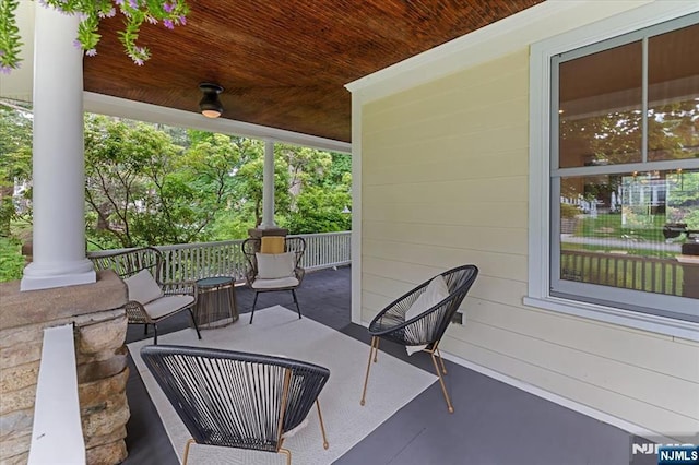 view of patio featuring a porch