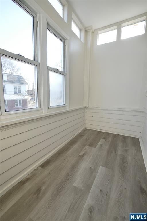 empty room featuring wood finished floors