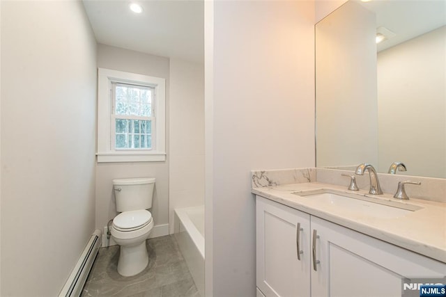 full bath featuring a baseboard radiator, vanity, toilet, and baseboards