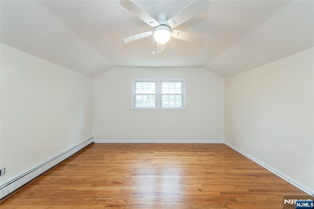 bonus room with lofted ceiling, a baseboard radiator, light wood-style flooring, and a ceiling fan