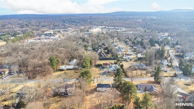 aerial view featuring a view of trees