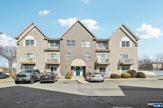 view of front of property with uncovered parking