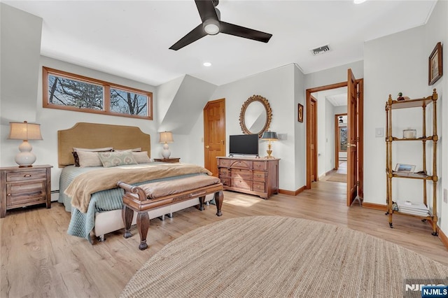 bedroom featuring light wood-style floors, visible vents, ceiling fan, and baseboards