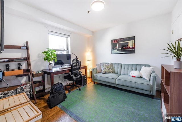 home office with wood finished floors