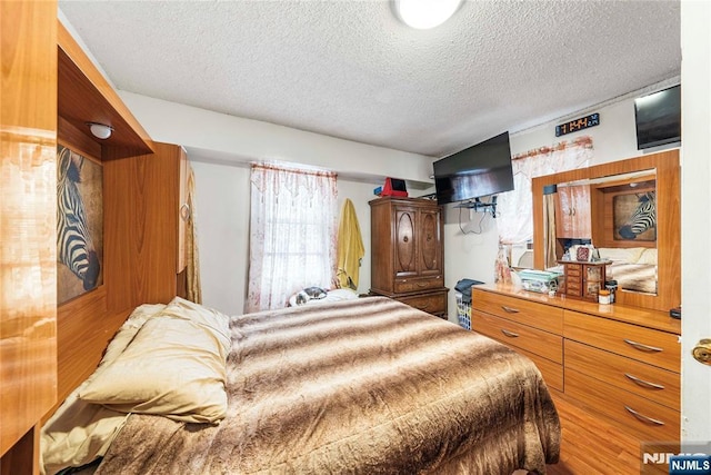 bedroom with a textured ceiling