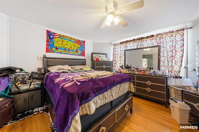 bedroom featuring ceiling fan and light wood finished floors