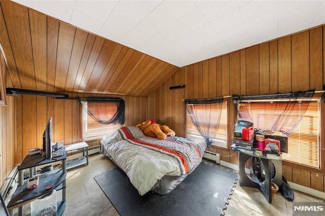 bedroom featuring vaulted ceiling, wooden walls, and baseboard heating