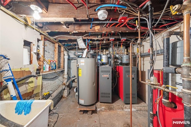 utility room featuring water heater and a heating unit