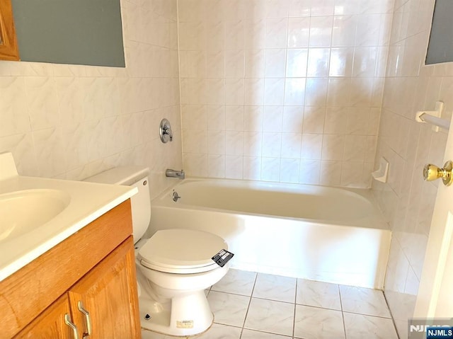 full bath featuring toilet,  shower combination, tile walls, and vanity