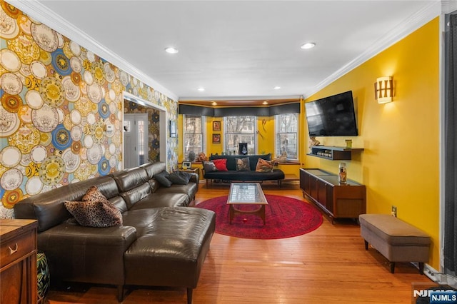 living room with recessed lighting, light wood-style flooring, and crown molding