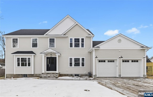 view of front of property with a garage and entry steps