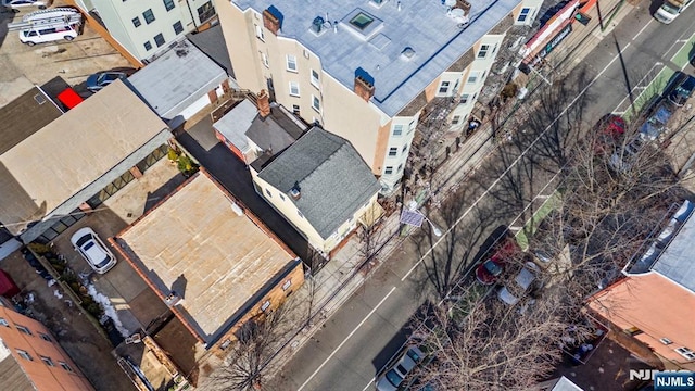 birds eye view of property with a residential view