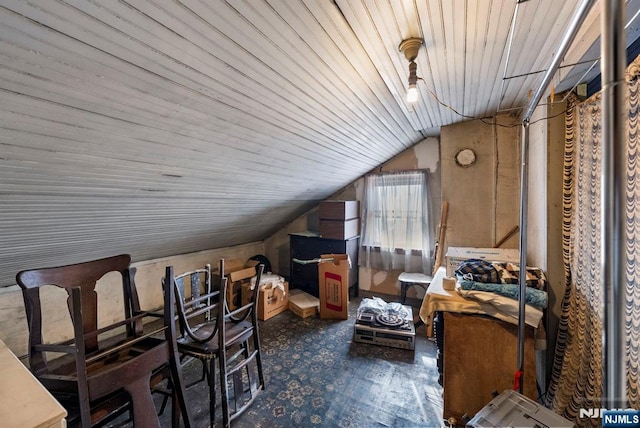 additional living space featuring lofted ceiling and wood ceiling