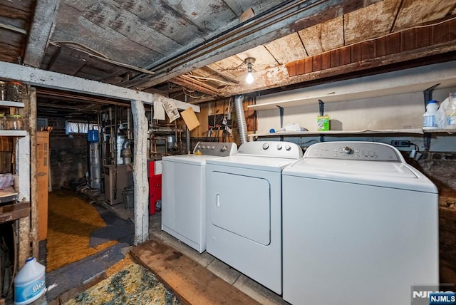 laundry room with laundry area and separate washer and dryer