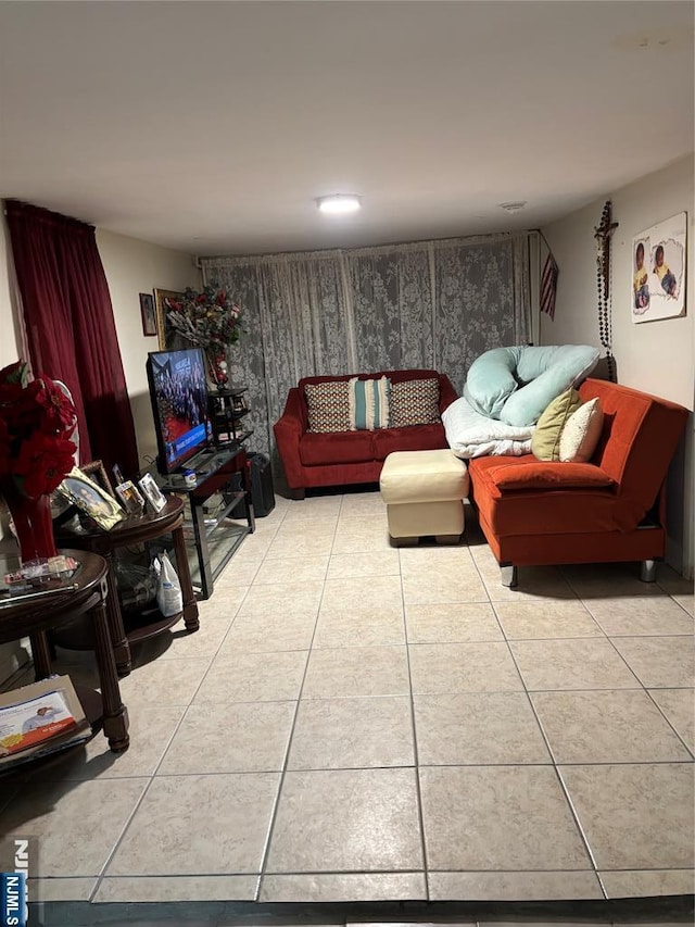 living area featuring light tile patterned floors