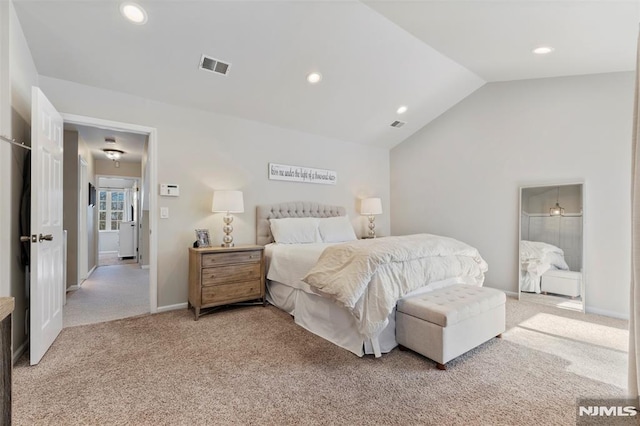 bedroom with lofted ceiling, carpet floors, visible vents, and recessed lighting