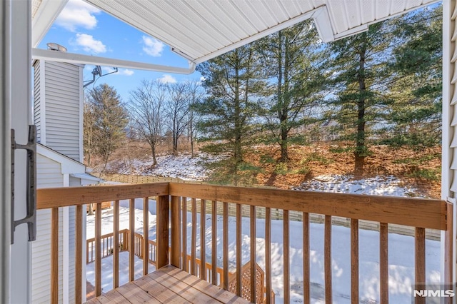 view of snow covered deck