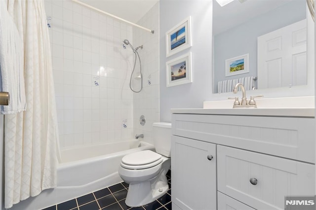 full bath with toilet, shower / bathtub combination with curtain, vanity, and tile patterned floors