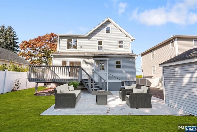 back of property featuring fence private yard, an outdoor living space with a fire pit, and a wooden deck