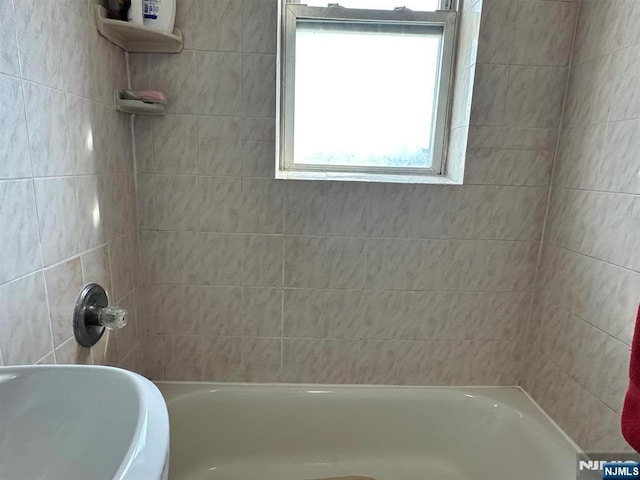 bathroom featuring shower / tub combination