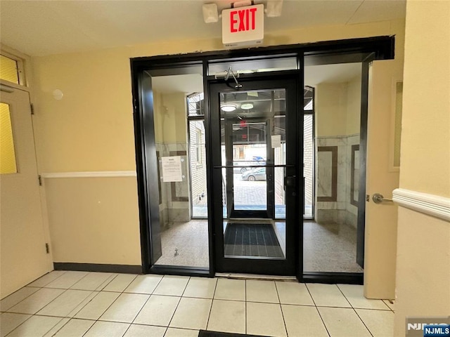 interior space with tile patterned floors