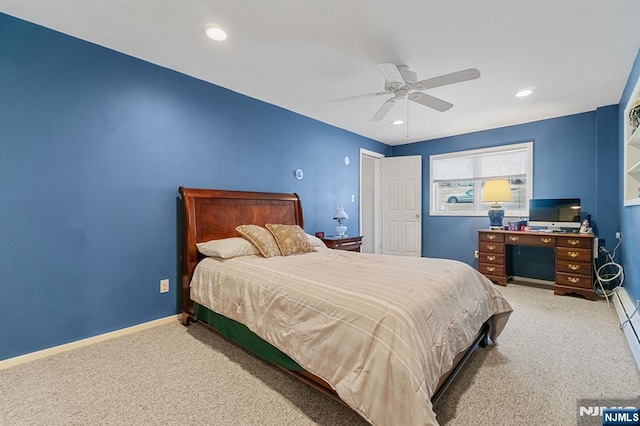 carpeted bedroom featuring a ceiling fan, recessed lighting, and baseboards