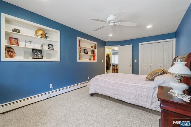 bedroom with a baseboard radiator, a closet, carpet, and recessed lighting