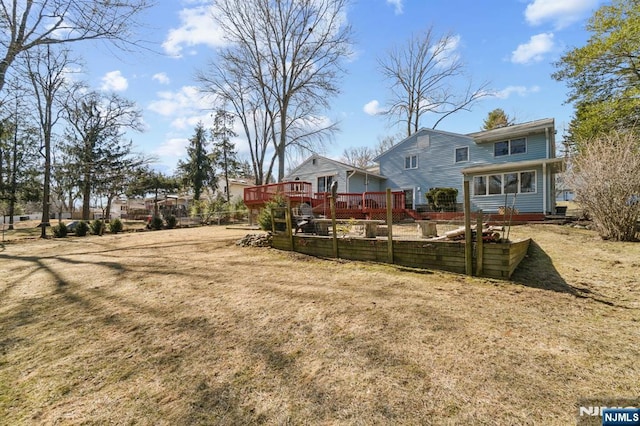 view of yard with a deck