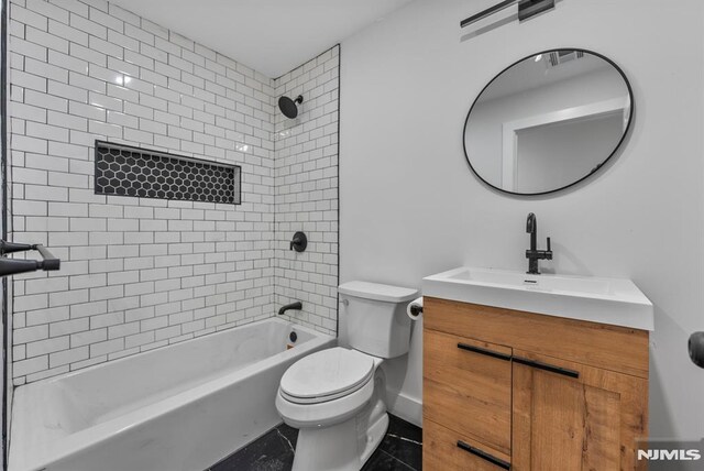 full bathroom with toilet, washtub / shower combination, visible vents, and vanity