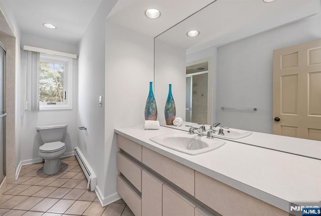 full bath featuring tile patterned flooring, toilet, vanity, baseboard heating, and a shower stall