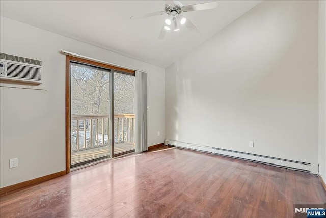 empty room featuring wood finished floors, a ceiling fan, baseboards, vaulted ceiling, and a wall mounted AC