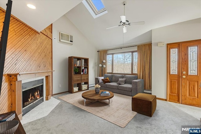 living room with a baseboard radiator, light colored carpet, a fireplace with flush hearth, wooden walls, and high vaulted ceiling